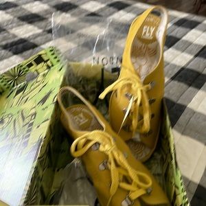 Fly London sling back shoe.